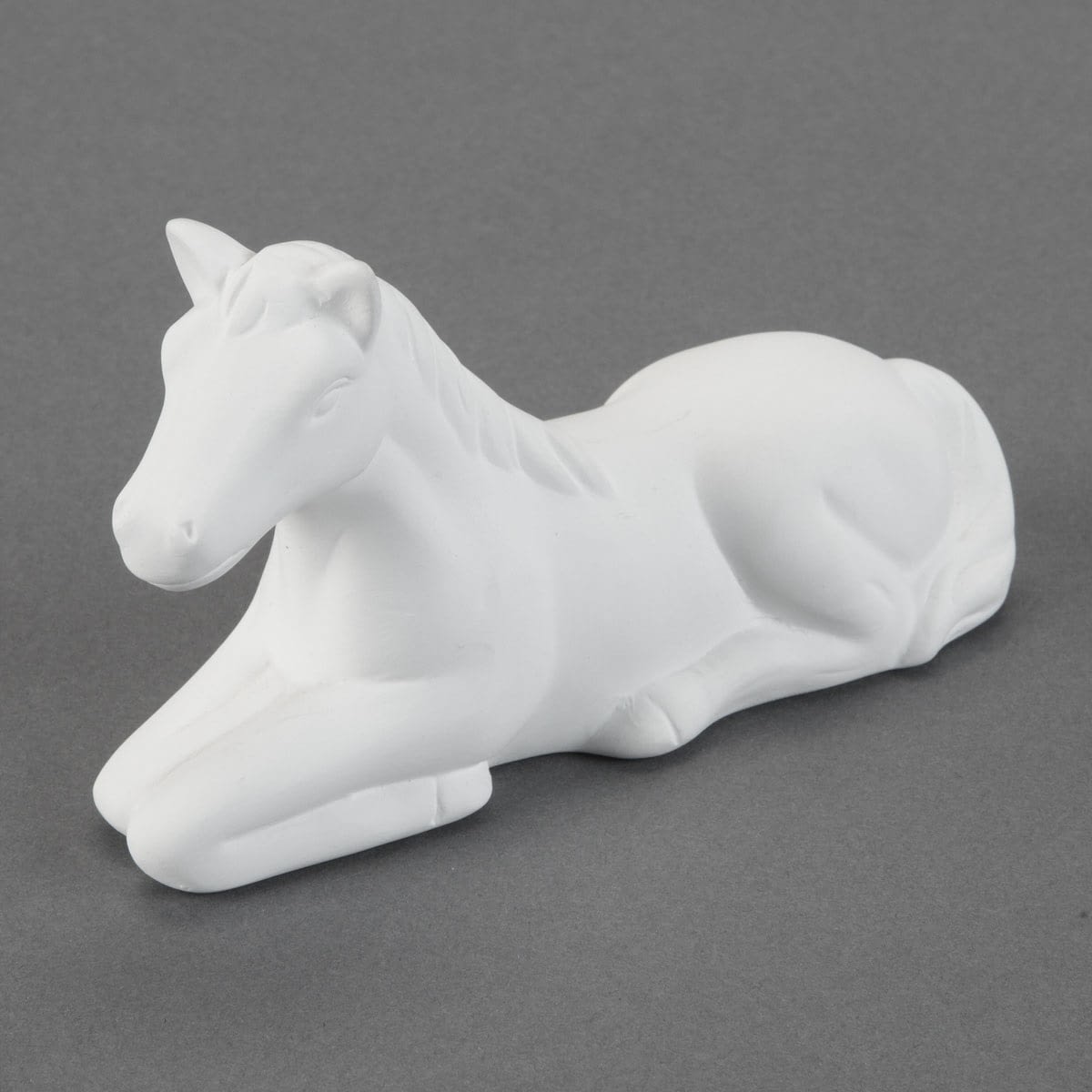 0063431_cute-laying-horse